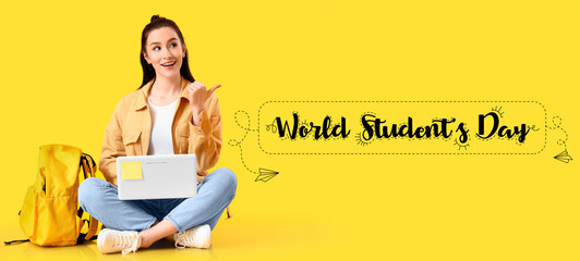 Canvas Print - Greeting card for World Students Day with woman holding laptop