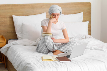 Sticker - Teenage girl after chemotherapy studying online in bedroom