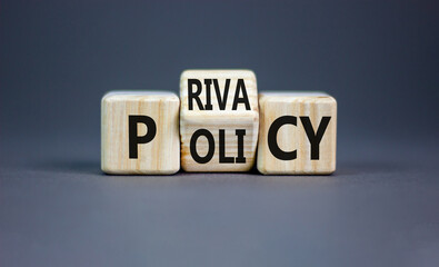 Privacy policy symbol. Concept words Privacy policy on wooden block on a beautiful grey table grey background. Business and privacy policy concept. Copy space.