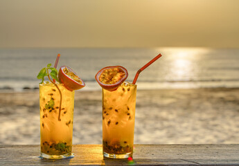 two drinks with passionfruit decoration