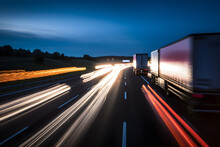 Background Photograph Of A Highway Truck On A Motorway Motion Blur Light Trails Evening Or Night Shot Of Trucks Doing Logistics And Transportation On A Highway 