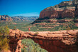 © travnikovstudio - Travel in Devil's Bridge Trail, scenic view panoramic landscape in Sedona, Arizona, USA. Happy young woman on the famous trail in Sedona