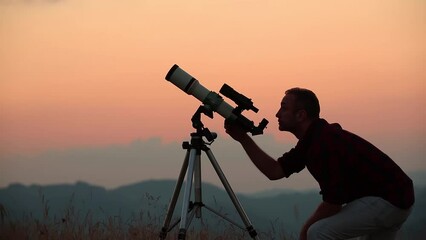 Wall Mural - astronomer looking at the starry skies and crescent moon with a telescope.