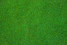 Overhead Of The Green Grass Of A Soccer Field Or Golf Course For Background Or Texture.Green Grass In The Stadium