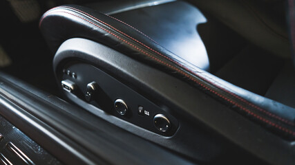 Wall Mural - closeup shot of a car front seat from beside, car concept. High quality photo