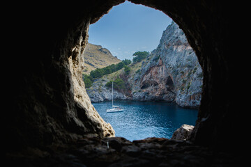 Torrent de Pareis Sa Calobra Mallorca, Spain. Beautiful sunset beach landscape, exotic tropical island nature, blue sea water, ocean waves, summer holidays vacation