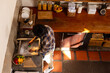 © Wavebreak Media - Indian man washing dishes in sunny kitchen at home, copy space