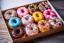 A Box Filled With Lots Of Colorful Dounts On The Table, By Arthur Pan, Pexels, In Rich Color, In A Row, Food Photography, Minimal