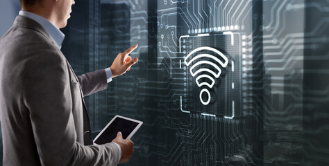 Wall Mural - man clicks on the logo wireless internet connection communication mobile technology concept