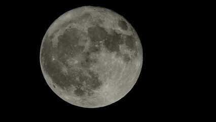 Wall Mural - full moon rising seen with telescope