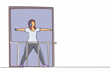 Poster - Continuous one line drawing healthy young woman with headphone practices yoga near window in balcony. Sports activity, workout, exercise, fitness, indoors. Single line draw design vector illustration