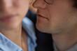 © Seventyfour - Closeup up of man intimidating woman in office dangerously close to her face, workplace harassment scene