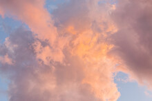 Pastel Pink Cloud In Light Blue Sky At Dusk
