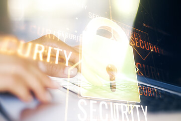 Aufkleber - Double exposure of creative lock hologram with chip and hands typing on laptop on background. Information security concept