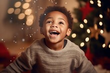 Excited Little Black Boy Near The Christmas Tree At Home