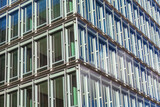 Fototapeta Do pokoju - Windows of a modern office building