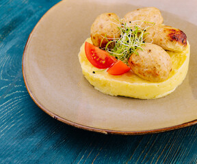 Wall Mural - mashed potatoes with meat cutlets on plate