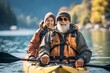 © Denisa - Happily retired couple enjoying travel moment paddling on kayak