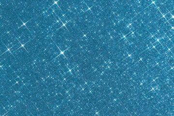 sparkling christmas texture. abstract light blue background with sparkles in the shape of stars. fes