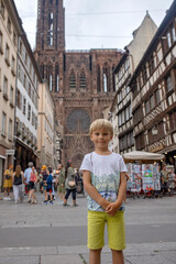 Wall Mural - Beautiful family with children, boys, visiting Strasbourg during summer vacation