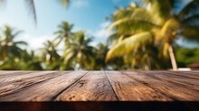 Wooden Table Top On Blurry Background Of Sea Island And Fresh Blue Sky, Coconut Tree Wooden Sky With Clouds On Background - For Product Display Montage Of Your Products.