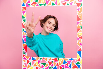 Poster - Photo portrait of lovely young lady show v-sign polaroid social media dressed stylish blue garment isolated on pink color background