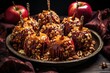 homemade caramel apples with nuts on tray