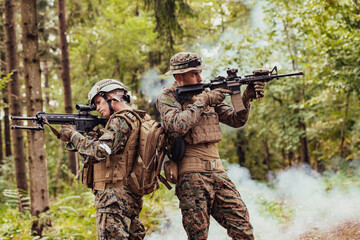 Wall Mural - Modern Warfare Soldiers Squad Running in Tactical Battle Formation Woman as a Team Leader