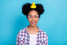 Photo Of Shocked Impressed Lady Wear Plaid Shirt Spectacles Holding Head Rubber Duck Isolated Blue Color Background