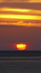 Wall Mural - beautiful landscape with sea sunset, timelapse. vertical video