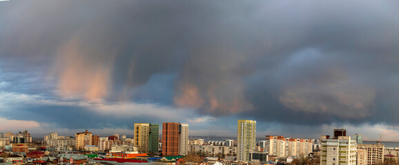 Wall Mural - Pink clouds over the city