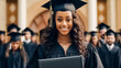 © BlazingDesigns - Portrait of a smiling african american female graduate in cap and gown looking at camera against the background of university graduates. Education, goal or university with a female pupil outside.