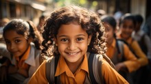 School Children. Smiling Children Looking At The Camera With Friends In The Background. Indian Children.