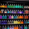 canvas print picture - Perfume shop window. Lots of colorful perfume bottles on the shelves.
