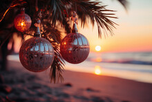 Pink Christmas Decorations On A Tropical Coastline. Christmas Holiday New Year On The Tropical Beach Background. 
