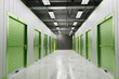 Rental Storage Units. Self storage unit cutaway. Storage box with green door. 3d image,