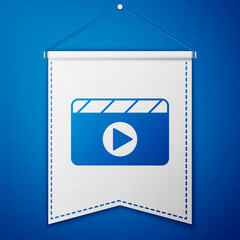 Poster - Blue Movie clapper icon isolated on blue background. Film clapper board. Clapperboard sign. Cinema production or media industry. White pennant template. Vector