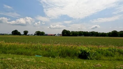 Sticker - Road Trip Through the Countryside. Traveling through rural farm country with open roads, big blue skies, rows of agricultural crops and agricultural industry buildings. Located in Southern IL, USA