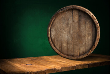 Wall Mural - Beer barrel with beer glasses on table on wooden background