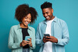 © AI_images - black woman and black man with phone on blue background.