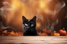 Old Wooden Table For Product Display With Halloween Background, Autumn Leaves And Black Cat. Thanksgiving Day