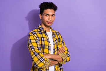 Canvas Print - Portrait of pleasant handsome nice man with stylish earrings wear plaid shirt holding arms crossed isolated on violet color background