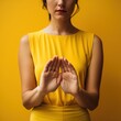 © GG - Zen Minimalism, Vibrant Hand Pose on Yellow - A Captivating Macro Marvel