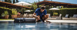 © Michal - Swimming pool cleaner or maintenance service.