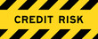 Yellow and black color with line striped label banner with word credit risk