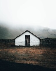 Wall Mural - Stunning view of a picturesque building situated at the top of a mountain in Iceland