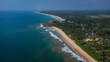 Coast of Sri Lanka. Indian Ocean, beach and hotels among the jungle and palm trees