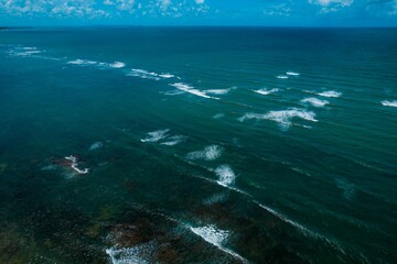 Sticker - Aerial view of a vast open expanse of the ocean.