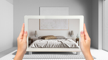 Wall Mural - augmented reality concept. hand holding tablet with ar application used to simulate furniture and de