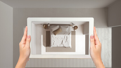 Wall Mural - augmented reality concept. hand holding tablet with ar application used to simulate furniture and de